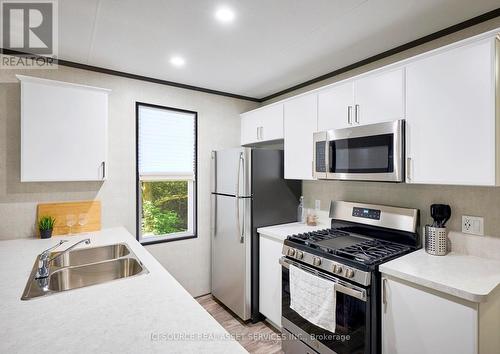 Getaway - 7100 County Rd 18, Alnwick/Haldimand, ON - Indoor Photo Showing Kitchen With Double Sink