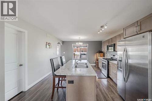 5500 Tutor Way, Regina, SK - Indoor Photo Showing Kitchen With Stainless Steel Kitchen With Double Sink
