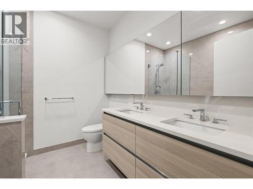 Primary ensuite with double vanity - 238 Leon Avenue Unit# 2107, Kelowna, BC - Indoor Photo Showing Bathroom