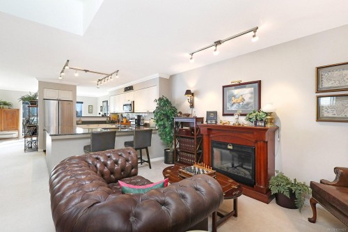 206-2275 Comox Ave, Comox, BC - Indoor Photo Showing Living Room With Fireplace