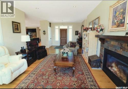 30 West Park Drive, Battleford, SK - Indoor Photo Showing Living Room With Fireplace