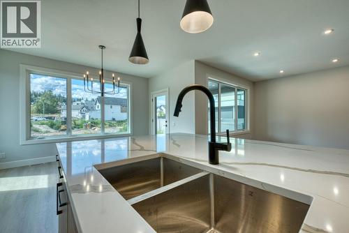 925 Bull Crescent, Kelowna, BC - Indoor Photo Showing Kitchen With Double Sink