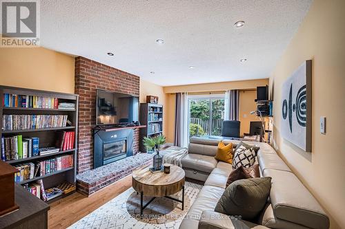 16 Ackrow Court, Toronto, ON - Indoor Photo Showing Living Room With Fireplace