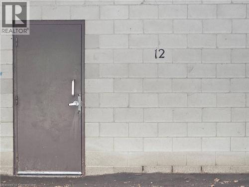 entrance door to basement of building from parking space #12 - 4 Avalon Place Unit# 102, Kitchener, ON - 