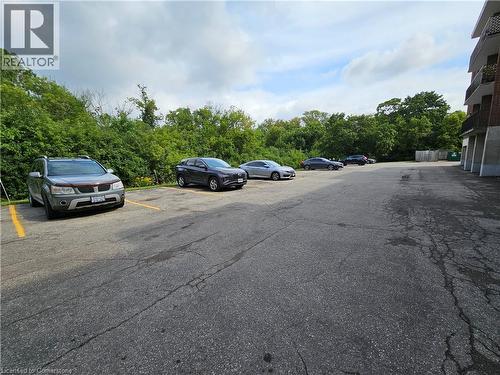 View of parking lot and some visitor parking spaces - 4 Avalon Place Unit# 102, Kitchener, ON - Outdoor