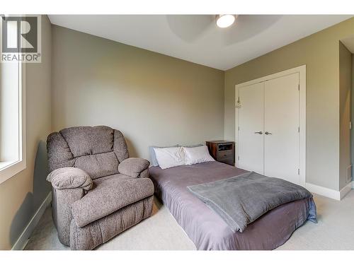 514 Quartz Crescent Unit# 6, Kelowna, BC - Indoor Photo Showing Bedroom
