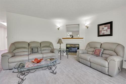 3-3038 Orchard Drive, Keremeos, BC - Indoor Photo Showing Living Room With Fireplace