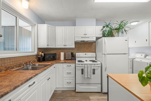 8101 Torrent Drive, Coldstream, BC - Indoor Photo Showing Kitchen With Double Sink