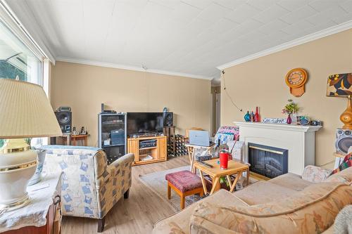 8101 Torrent Drive, Coldstream, BC - Indoor Photo Showing Living Room With Fireplace