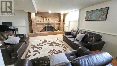 45 Locust Crescent, London South (South X), ON - Indoor Photo Showing Living Room With Fireplace