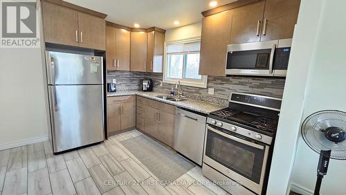 45 Locust Crescent, London South (South X), ON - Indoor Photo Showing Kitchen With Double Sink