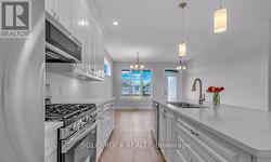 Kitchen in foreground/dining area in background - 