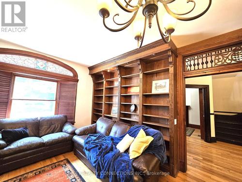 Living Room with Pocket Door - 208 King Street E, Kingston, ON - Indoor