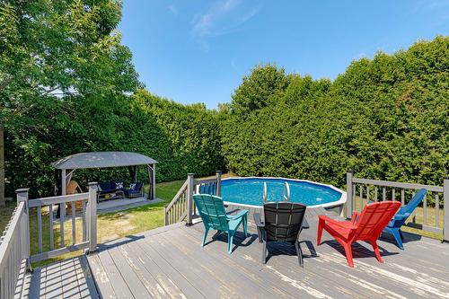Back facade - 1018 Rue Marcel, Saint-Jérôme, QC - Outdoor With Above Ground Pool