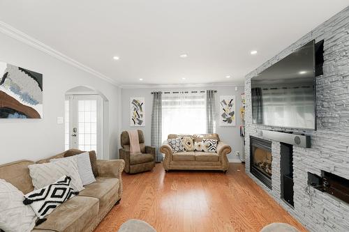 Living room - 1018 Rue Marcel, Saint-Jérôme, QC - Indoor Photo Showing Living Room With Fireplace