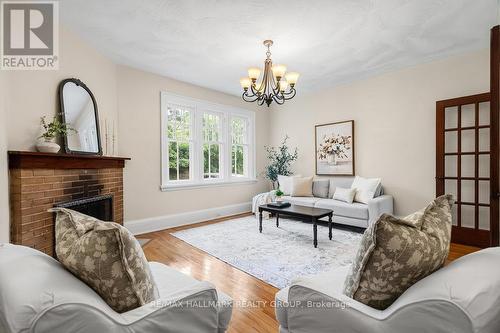 386 First Avenue, Ottawa, ON - Indoor Photo Showing Living Room With Fireplace