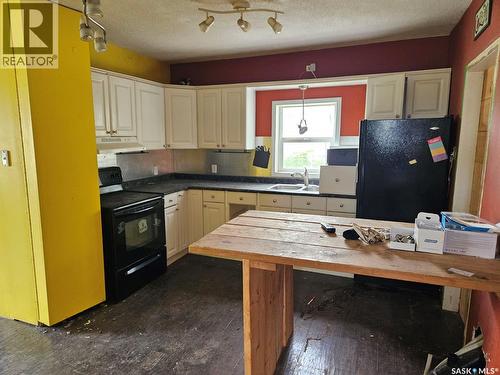 603 Buffer Avenue, Vonda, SK - Indoor Photo Showing Kitchen With Double Sink