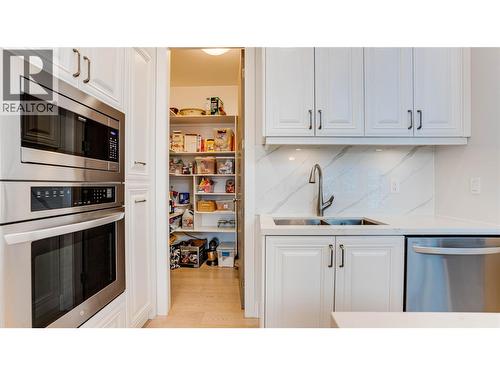 8792 Cortland Place, Coldstream, BC - Indoor Photo Showing Kitchen With Double Sink