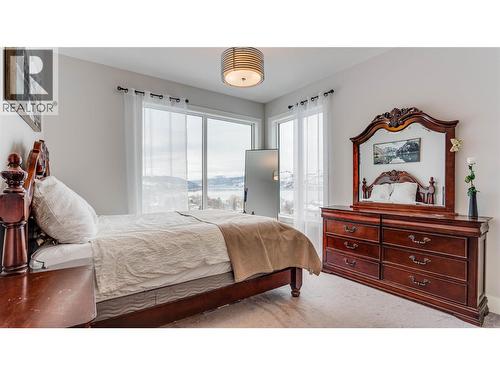 8792 Cortland Place, Coldstream, BC - Indoor Photo Showing Bedroom