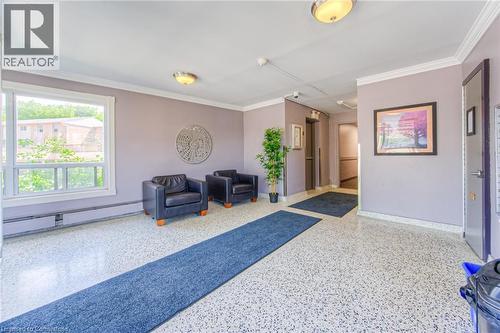 Common area with crown molding - 283 Fairway Road N Unit# 501, Kitchener, ON - Indoor Photo Showing Other Room