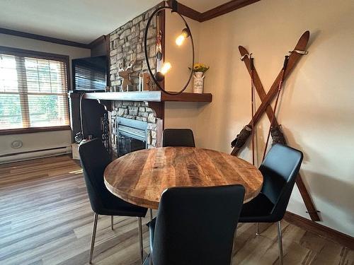 Dining room - 6-166 Rue Du Mont-Plaisant, Mont-Tremblant, QC - Indoor Photo Showing Dining Room With Fireplace