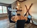Dining room - 6-166 Rue Du Mont-Plaisant, Mont-Tremblant, QC  - Indoor Photo Showing Dining Room With Fireplace 