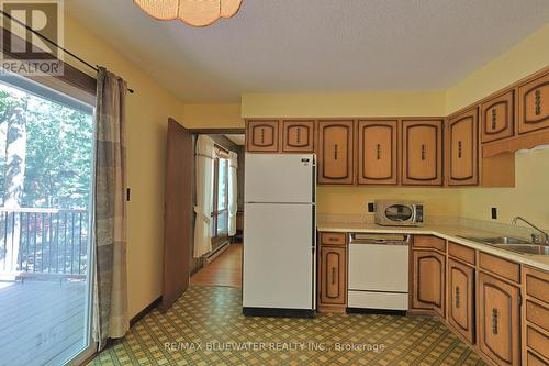 10346 Pines Parkway, Lambton Shores (Grand Bend), ON - Indoor Photo Showing Kitchen With Double Sink