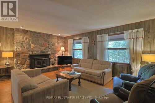 10346 Pines Parkway, Lambton Shores (Grand Bend), ON - Indoor Photo Showing Living Room With Fireplace