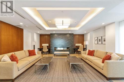 Gr17 - 1575 Lakeshore Road W, Mississauga, ON - Indoor Photo Showing Living Room With Fireplace