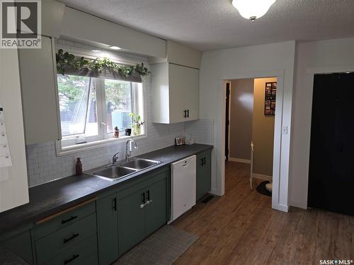 213 9Th Street E, Wynyard, SK - Indoor Photo Showing Kitchen With Double Sink