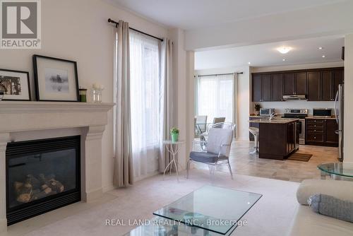 6284 St. Michael Avenue, Niagara Falls, ON - Indoor Photo Showing Living Room With Fireplace