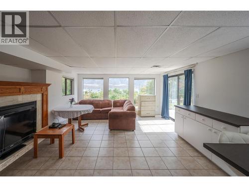 8507 92Nd Avenue, Osoyoos, BC - Indoor Photo Showing Living Room With Fireplace