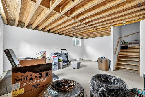 Salle familiale - 25 Rue St-Paul, Laval (Sainte-Rose), QC - Indoor Photo Showing Basement