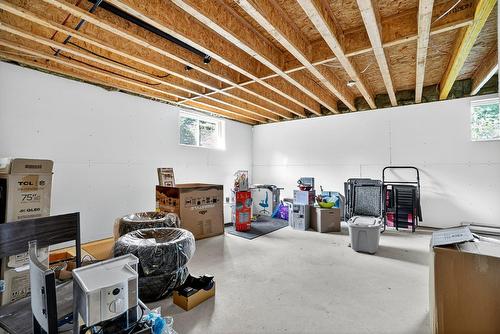 Salle familiale - 25 Rue St-Paul, Laval (Sainte-Rose), QC - Indoor Photo Showing Basement