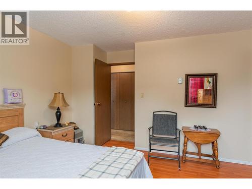 108 Colley Street, Warfield, BC - Indoor Photo Showing Bedroom