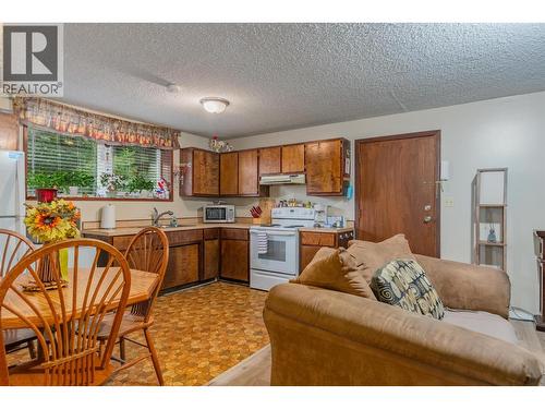 108 Colley Street, Warfield, BC - Indoor Photo Showing Kitchen With Double Sink