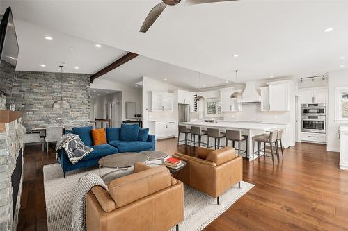 647 Royal Pine Drive, Kelowna, BC - Indoor Photo Showing Living Room With Fireplace
