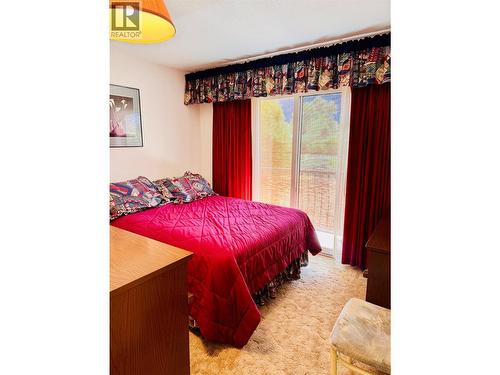 1270 59 Avenue, Grand Forks, BC - Indoor Photo Showing Bedroom