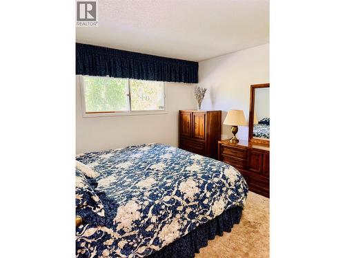 1270 59 Avenue, Grand Forks, BC - Indoor Photo Showing Bedroom