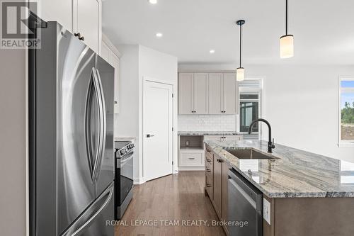 Similar model image; builder variations possible. - 1020 Moore Street, Brockville, ON - Indoor Photo Showing Kitchen With Upgraded Kitchen