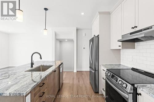 Similar model image; builder variations possible. - 1020 Moore Street, Brockville, ON - Indoor Photo Showing Kitchen With Upgraded Kitchen