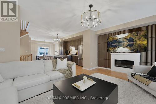 12 Heathrow Lane, Caledon, ON - Indoor Photo Showing Living Room With Fireplace