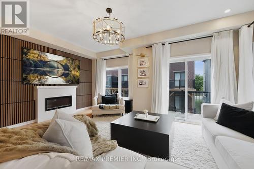 12 Heathrow Lane, Caledon, ON - Indoor Photo Showing Living Room With Fireplace