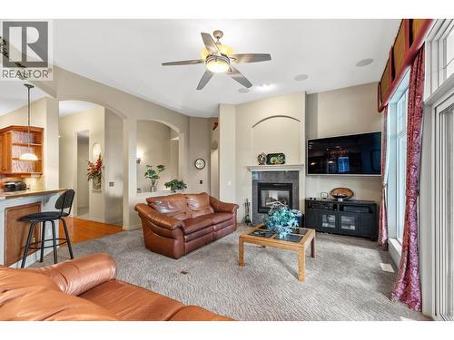 4520 Gallaghers Lookout Unit# 2, Kelowna, BC - Indoor Photo Showing Living Room With Fireplace