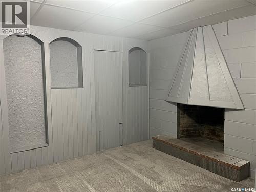 133 Halifax Street N, Regina, SK - Indoor Photo Showing Other Room With Fireplace