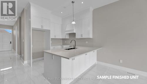 920 Garden Court Crescent, Woodstock, ON - Indoor Photo Showing Kitchen With Double Sink