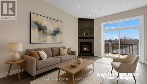 920 Garden Court Crescent, Woodstock, ON - Indoor Photo Showing Living Room With Fireplace