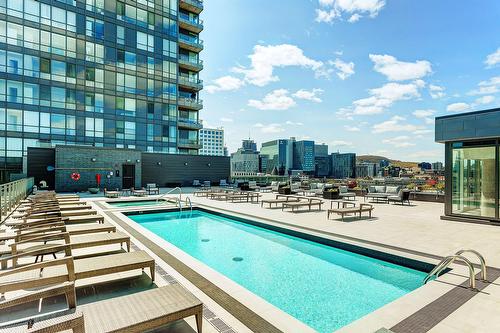 Pool - 305-360 Rue Atateken, Montréal (Ville-Marie), QC - Outdoor With In Ground Pool