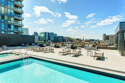 Pool - 305-360 Rue Atateken, Montréal (Ville-Marie), QC - Outdoor With In Ground Pool