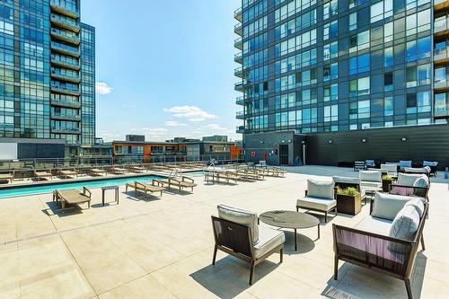 Pool - 305-360 Rue Atateken, Montréal (Ville-Marie), QC - Outdoor With In Ground Pool